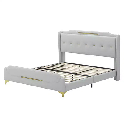 Cama King de plataforma de piel sintética con cabecero y pie de cama de ala, detalles dorados, capacidad de 800 lb